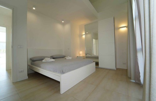 Ameglia Villa | Enchanting Villa Amidst Mediterranean Trees with Pool Access