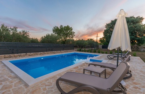 Oklaj Villa | Villa Vitis: Nature Retreat with Pool and Ocean Views