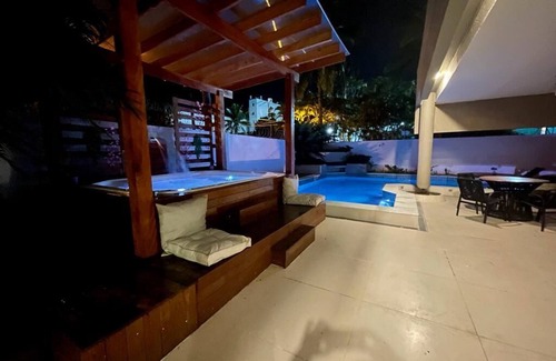 Balneario Praia do Pernambuco House | Elegant Villa with Spa & Pool, Steps from the Beach