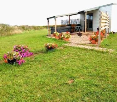 East Drayton House | Cozy Wooden Tiny House with Hot Tub & Ocean View