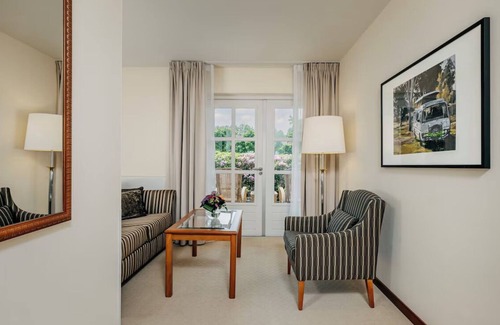 Ootmarsum Hotel | Beautifully Lit Room Overlooking Lush Parkland in Ootmarsum with Wellness Area