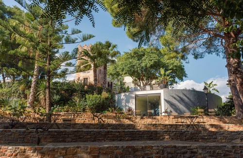 Castelldefels Apartment | Historic Tower Stay with Pool & Family-Friendly Amenities