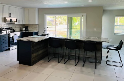 Harbour Heights House | Updated Canal Home with Heated Pool & Ocean Views