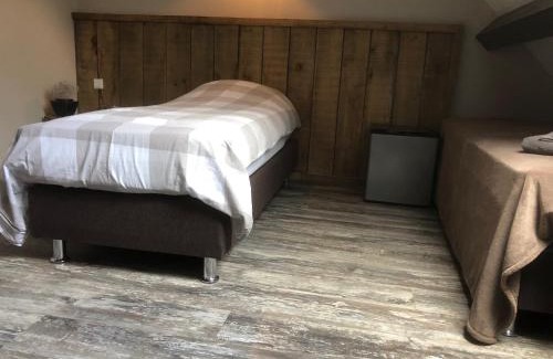 De Bus Bed & Breakfast | Cozy Bed & Breakfast de Bimd Hoeve with Family-Friendly Amenities