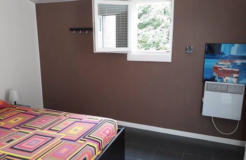 Daux Bed & Breakfast | Cozy Bedroom with Private Access & Poolside Relaxation