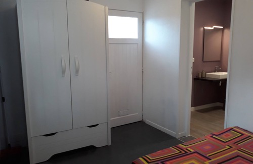 Daux Bed & Breakfast | Cozy Bedroom with Private Access & Poolside Relaxation