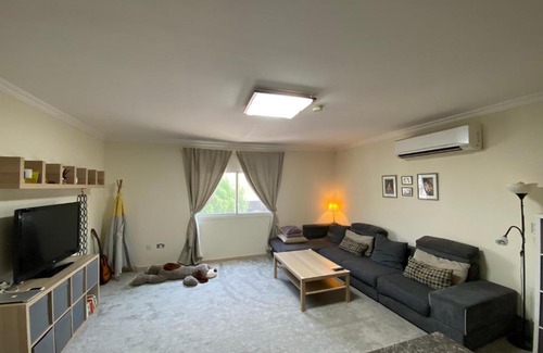Doha House | Inviting First Floor Flat with Pool and Family Amenities