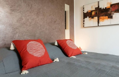 Cabrerets Apartment | Relaxing Bedroom with Dining Area & Garden View Amenities