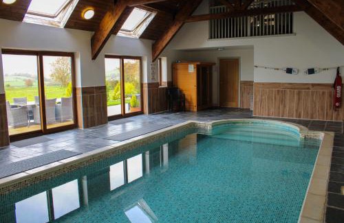 Newtown House | Experience Bliss at Bedw Barn: 4-Star Getaway with Spa