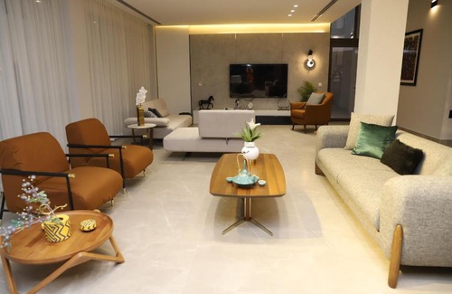 Al-Maghtas Villa | Beit Elhala Villa: Oceanfront Getaway with Pool & Hot Tub