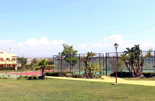 Puerto de la Duquesa Apartment | Elegant Apartment Steps from the Beach with Ocean View