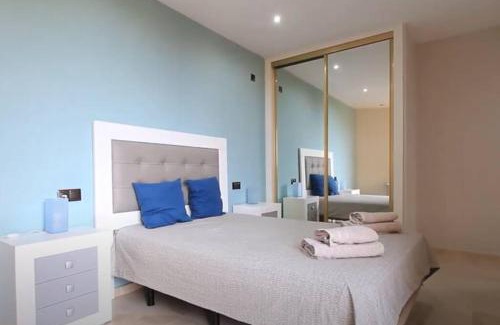 Puerto de la Duquesa Apartment | Elegant Apartment Steps from the Beach with Ocean View