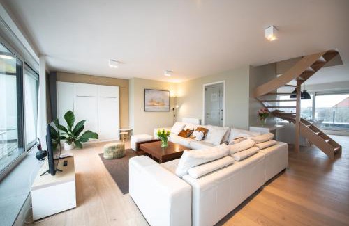 Westende Apartment | Welcome to Belcasa Family Suites & Lofts: Oceanview Getaway