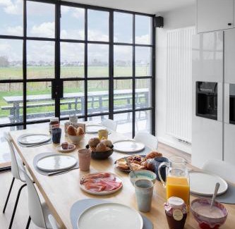 Westende House | Belcoast Guesthouse: Oceanfront Comfort with Pool Access