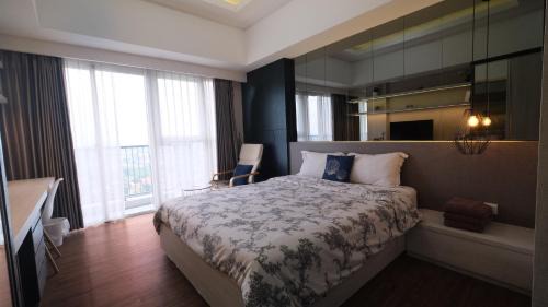 Bumi Serpong Damai Apartment | Cozy Bella Casa: Comfortable Stay Near AEON and ICE BSD