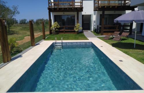 Passo de Torres Hotel | Discover Bella Ciao Hospedaria: Pet-Friendly Oceanfront Retreat
