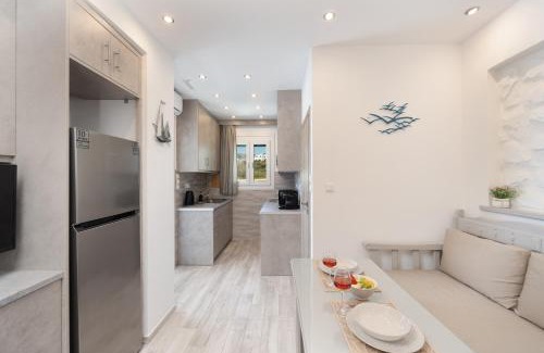 Moutsouna Apartment | Oceanfront Escape at Bella Vista Mare - Rated 10/10!