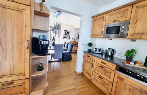 Kitzbuehel House | Elegant Belle Kitz Urban Villa with Sauna and Garden Oasis