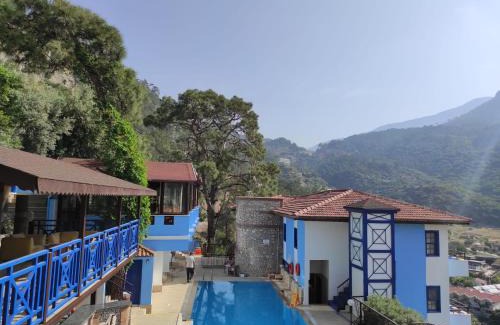 Oludeniz City Center Hotel | Relaxing Belle Vue Ölüdeniz: Oceanfront Retreat with Pool