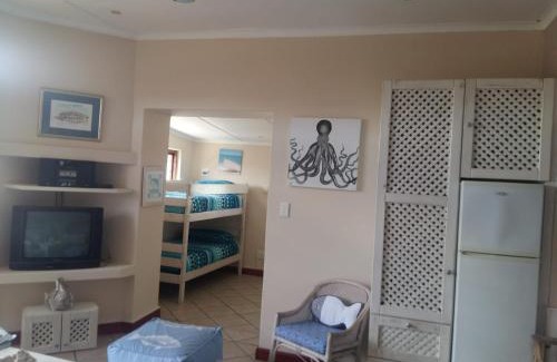 Still Bay Apartment | Relax at Bellevue Resort: Poolside Retreat Awaits You