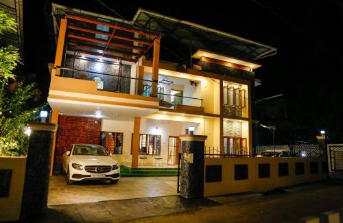 Thrissur House | Discover Belljem Homes: Your Private Resort with Pool