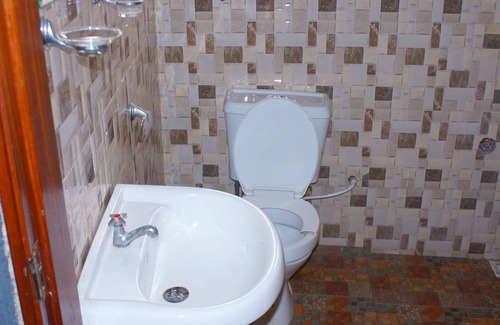 Ol Kalou Bed & Breakfast | Comfortable Stay at Bells Guest House with Family-Friendly Amenities