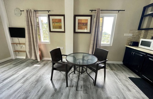 Colonarie Apartment | Exceptional Belmont Apartments with Oceanfront Views