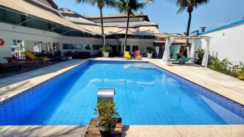 Balneario Praia do Pernambuco Hotel | Oceanfront Bliss at Bene Beach - Pousada Guarujá