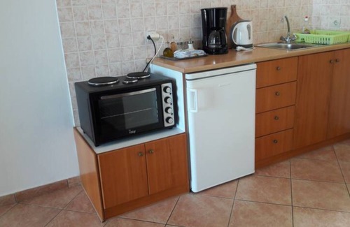 Korithi Apartment | Benetia Apartment 3: Oceanfront Escape with Pool & Breakfast