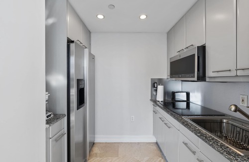 South of Fifth Apartment | Pet-Friendly Bentley Beach Condo with Ocean View & Pool