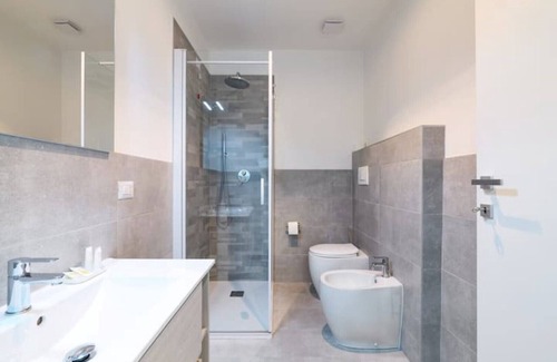Citta Bassa Apartment | Elegant Sha Suite in Bergamo's City Center with Great Amenities