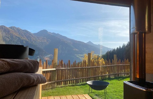 San Martino in Passiria Ski Chalet | Luxury Bergchalet Obertalerhof with Hot Tub & Pet Friendly