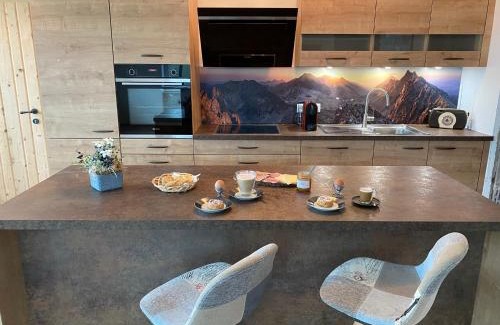 Sankt Johann in Tirol Apartment | Discover Berghof Haselsberger Appartements with Hot Tub Access