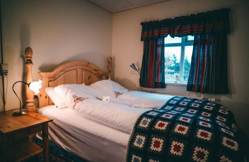 Hvammstangi Apartment | Experience Bessastaðir Guesthouse with Private Beach Access