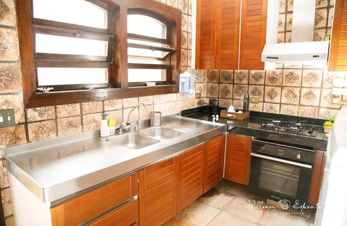 Balneario Praia do Pernambuco House | Popular Beachfront Retreat with Spa & Ocean Views in Guaruja