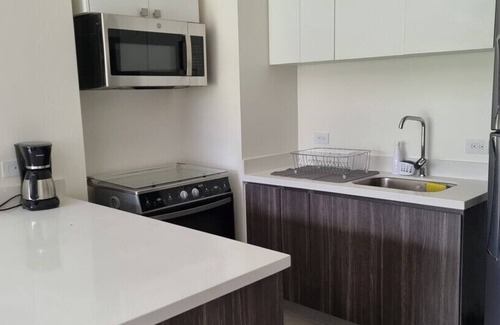 Alajuela Apartment | Top-rated Airport Hotel with Pool and Family Amenities
