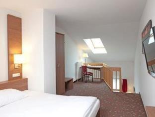 Erlangen Hotel | Quality Hotel Erlangen Garni: Pet-Friendly & Family-Oriented
