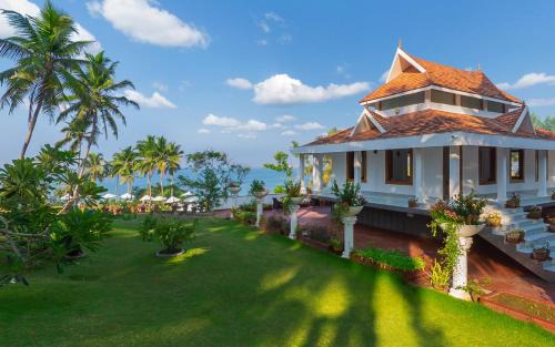 Neyyattinkara Resort | Relax at Bethsaida Hermitage: Beachfront Bliss Awaits