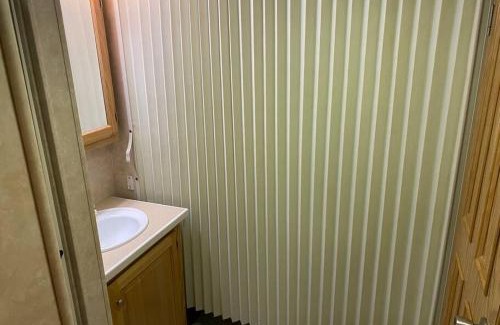 Beulah Apartment | Discover Betsie: Cozy RV Retreat with Hot Tub & Firepit