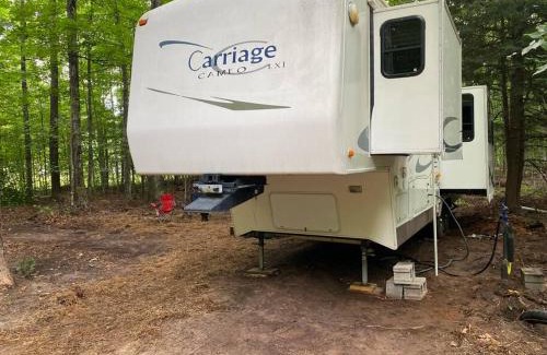 Beulah Apartment | Discover Betsie: Cozy RV Retreat with Hot Tub & Firepit