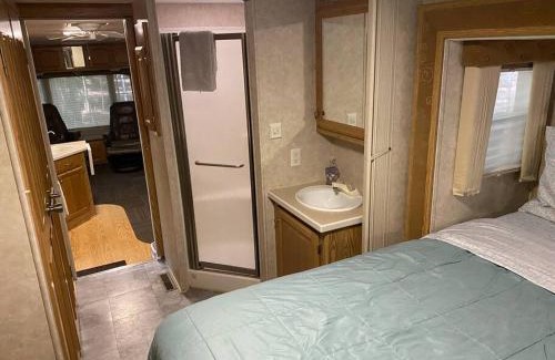 Beulah Apartment | Discover Betsie: Cozy RV Retreat with Hot Tub & Firepit