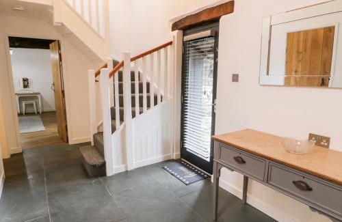 Llanfair House | Discover Beudy Bach: 4-Star Retreat for Families and Pets
