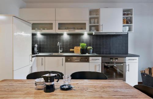 Saalfelden am Steinernen Meer Apartment | Explore Bewegte Berge Apartments - 4-Star Family Getaway