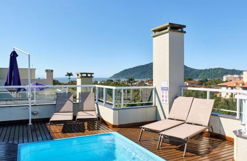Barra da Lagoa Apartment | Discover BH56 Conforto with Gourmet Balcony and Scenic Views