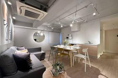 Hiroshima City Centre Apartment | Stylish bHOTEL Art Bldg: Prime Location & Family Friendly