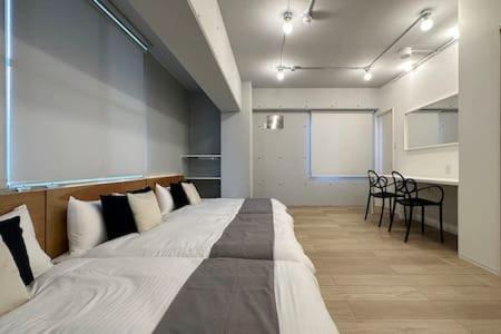 Hiroshima City Centre Apartment | Stylish bHOTEL Art Bldg: Prime Location & Family Friendly