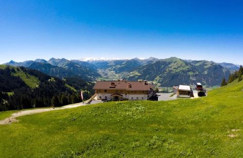 Kitzbuehel Hotel | Exceptional BichlAlm Berggasthof: Spa & Pet-Friendly Stay