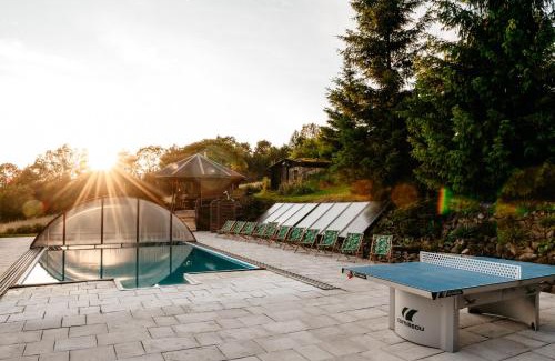 Lesko Ski Chalet | Experience Bieszczadzka Bania: Oceanfront Retreat with Pool