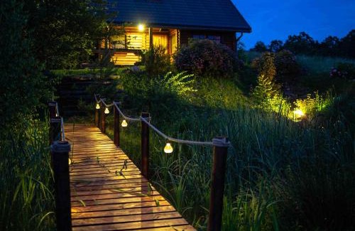 Lesko Ski Chalet | Experience Bieszczadzka Bania: Oceanfront Retreat with Pool