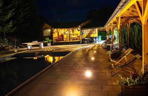 Lesko Ski Chalet | Experience Bieszczadzka Bania: Oceanfront Retreat with Pool